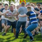 Bottle Kicking and Hare Pie Scrambling. Wild Easter Battle for Beer Barrels in Leicestershire, England