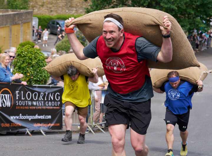 Tetbury Woolsack Races. Carrying Heavy Sacks Up Steep Hills in Gloucestershire, England